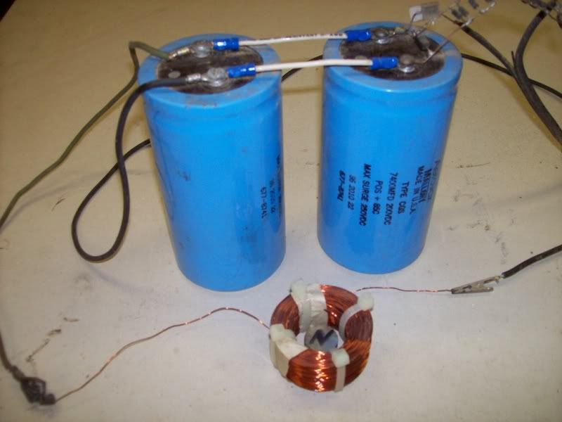 The capacitor bank is 2 capacitors in parallel. Each cap is 7400 MFD 200 VDV 