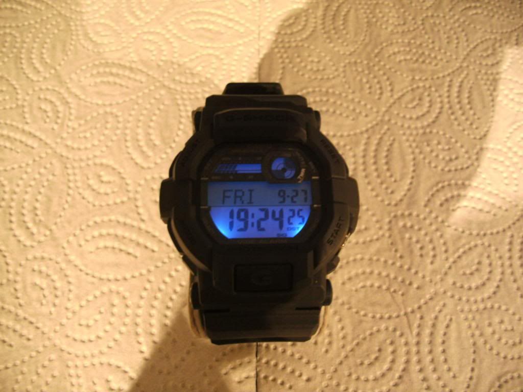 digital watch with red digits