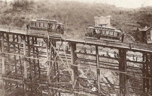Two cablecars pose on the trestle